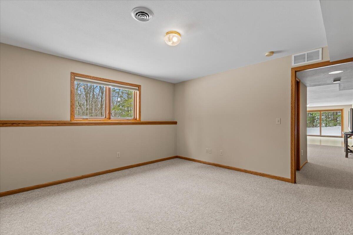 N5968 County Road P Herman, WI 53050 - Photo 45 of 66 Lower Level Bedroom