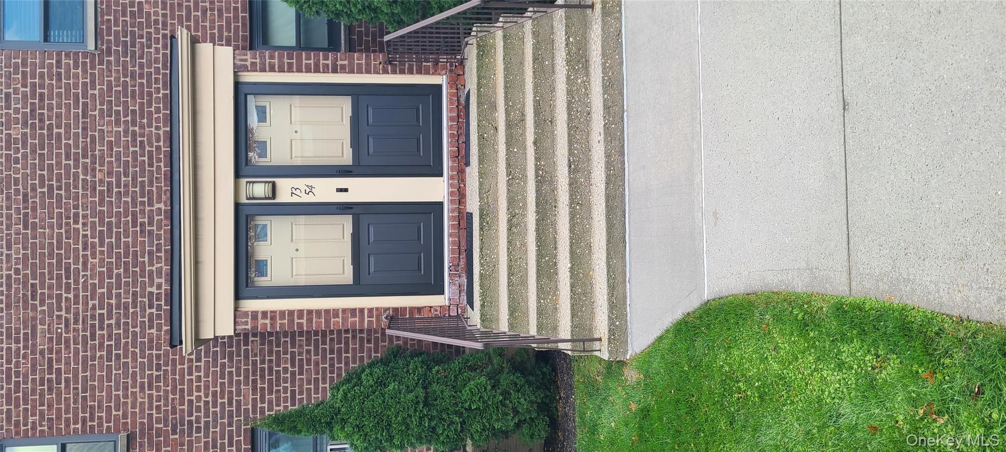 a view of a house with a swimming pool