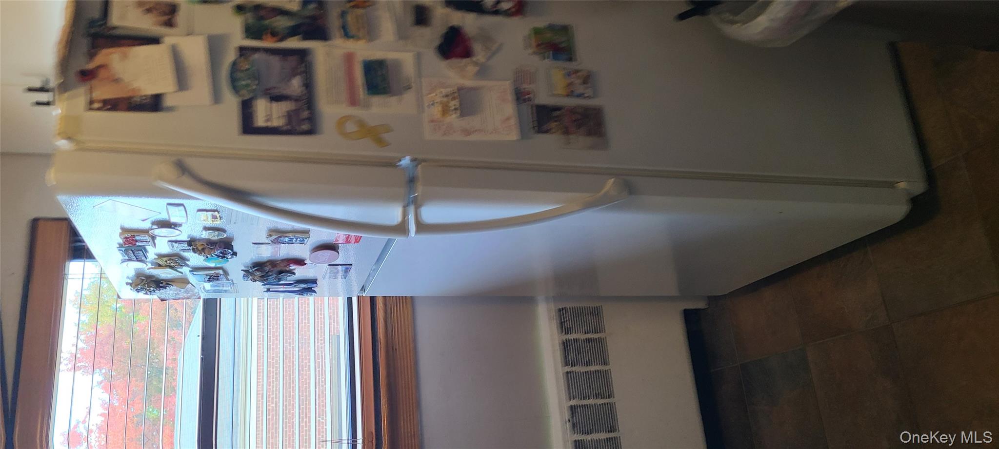 73-54 Springfield Boulevard, Unit 54A2 Queens, NY 11364 - Photo 4 of 11 a view of a hallway with entryway