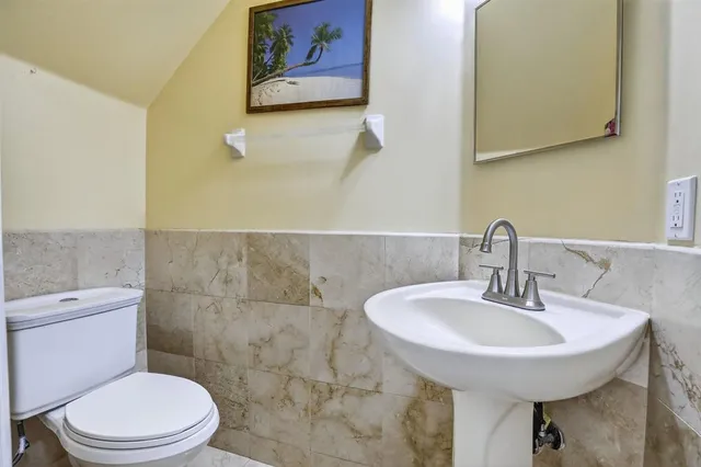 a bathroom with a sink and a toilet