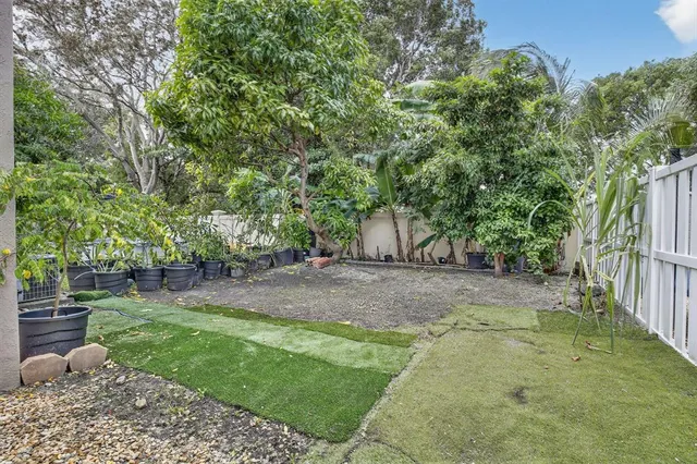 a view of backyard with green space
