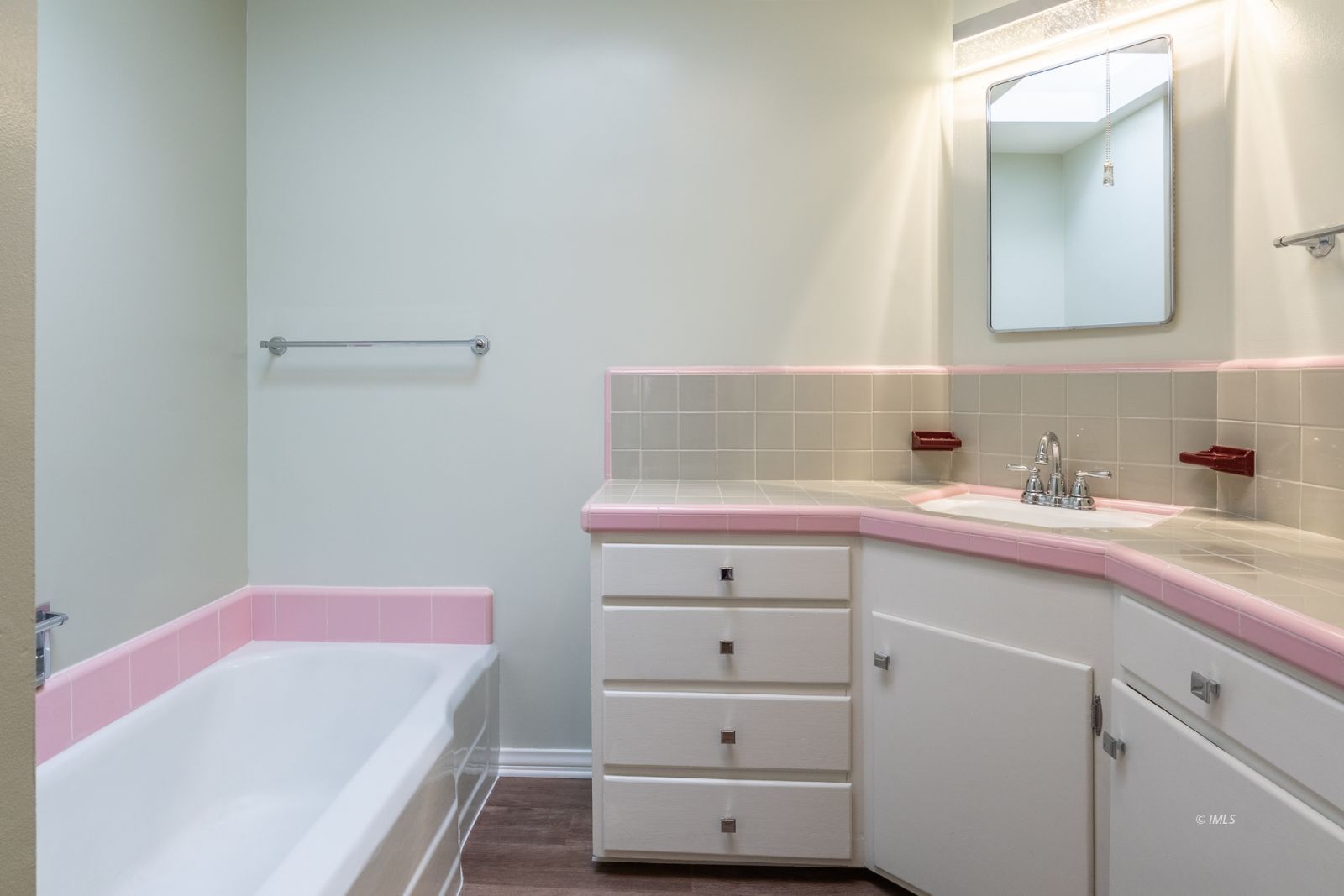 317 West Main Street Independence, CA 93526 - Photo 11 of 33 a bathroom with a sink and a mirror