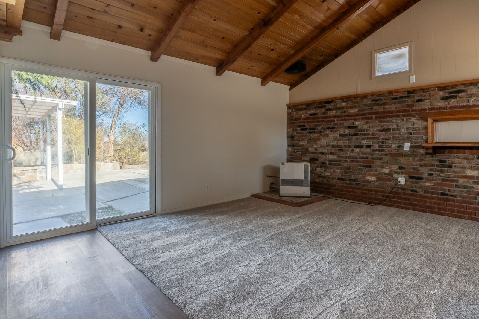 317 West Main Street Independence, CA 93526 - Photo 13 of 33 a view of an empty room with a fireplace