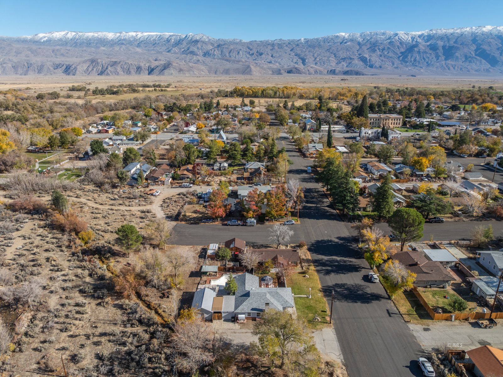 317 West Main Street Independence, CA 93526 - Photo 25 of 33 an aerial view of residential house and sandy dunes