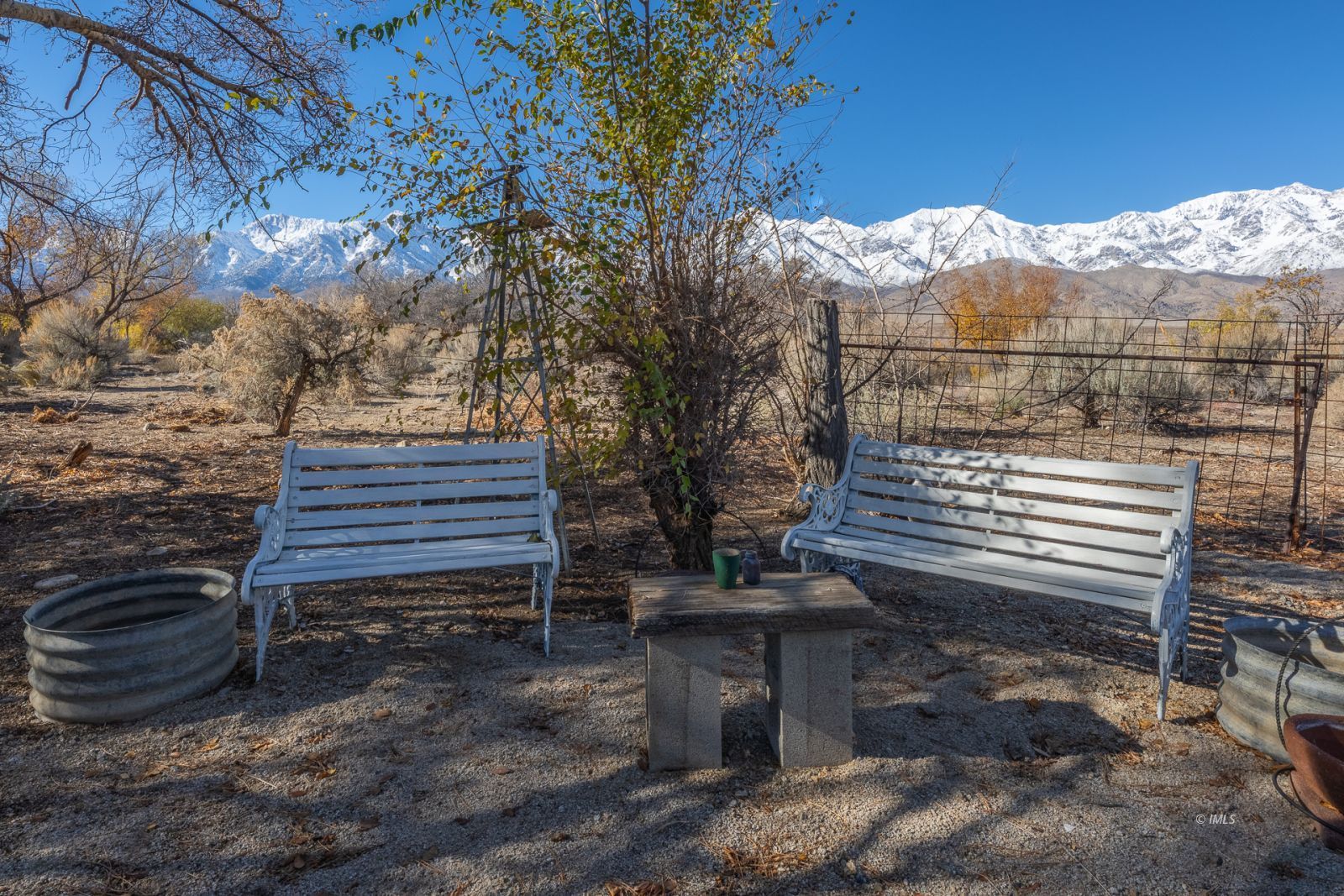 317 West Main Street Independence, CA 93526 - Photo 28 of 33 a view of a backyard with a barbeque grill and mountain view