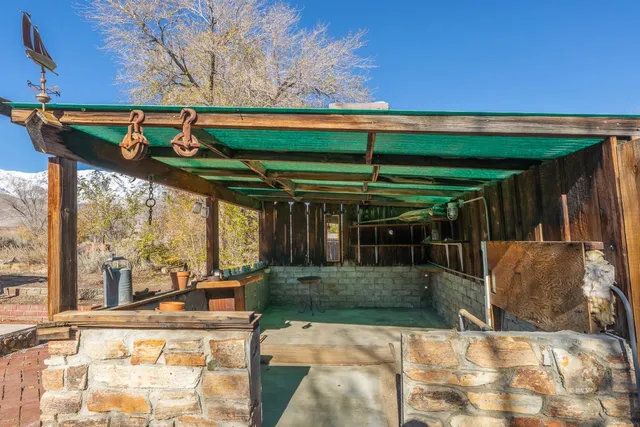 a view of house with outdoor seating