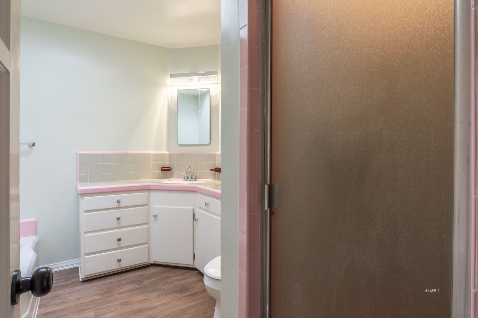 317 West Main Street Independence, CA 93526 - Photo 10 of 33 a room with white cabinets and sink