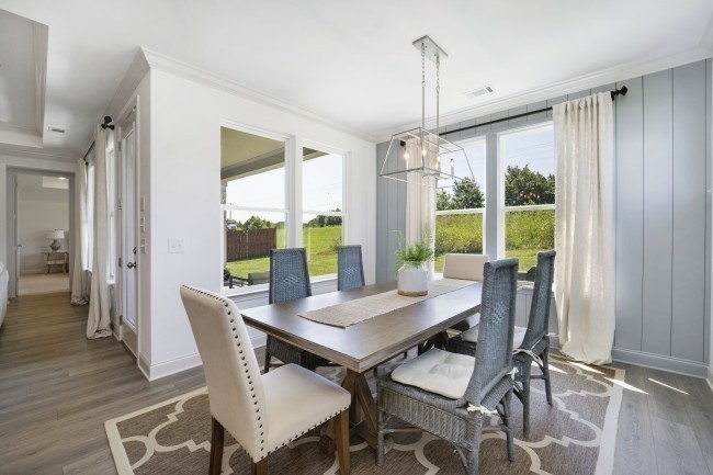 1121 Batbriar Road Murfreesboro, TN 37128 - Photo 8 of 21 a view of a dining room with furniture window and wooden floor