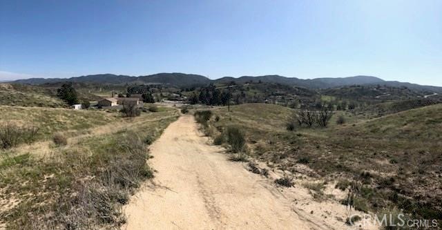 0 Elizabeth Lake Road Lake Hughes, CA 93532 - Photo 16 of 33 a view of a dry yard with mountains in the background