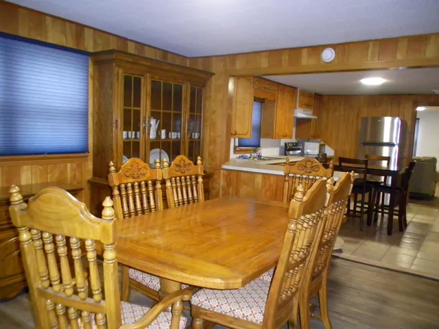 a view of a dining room with furniture