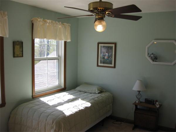 715 George Carter Road Becket, MA 01223 - Photo 19 of 22 a bedroom with a bed and a window