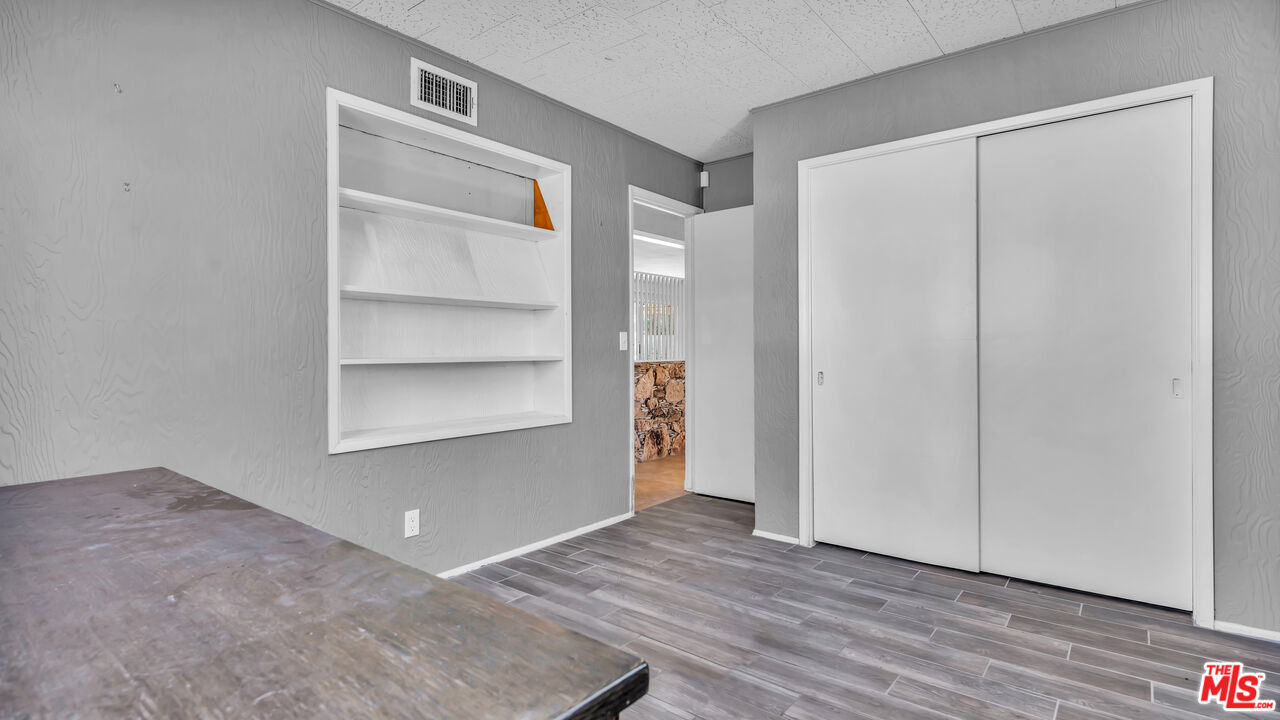 494 North Monterey Road Palm Springs, CA 92262 - Photo 17 of 30 a view of an empty room with a closet