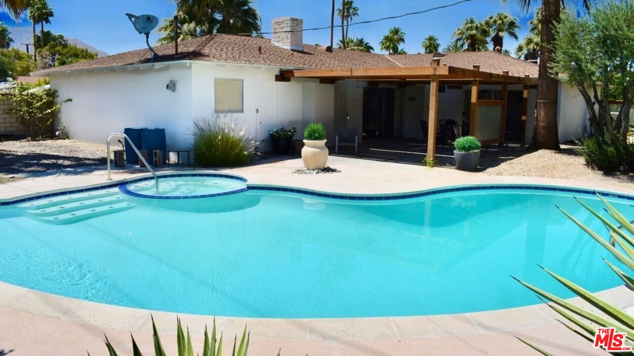 494 North Monterey Road Palm Springs, CA 92262 - Photo 2 of 30 a view of a house with backyard and a patio