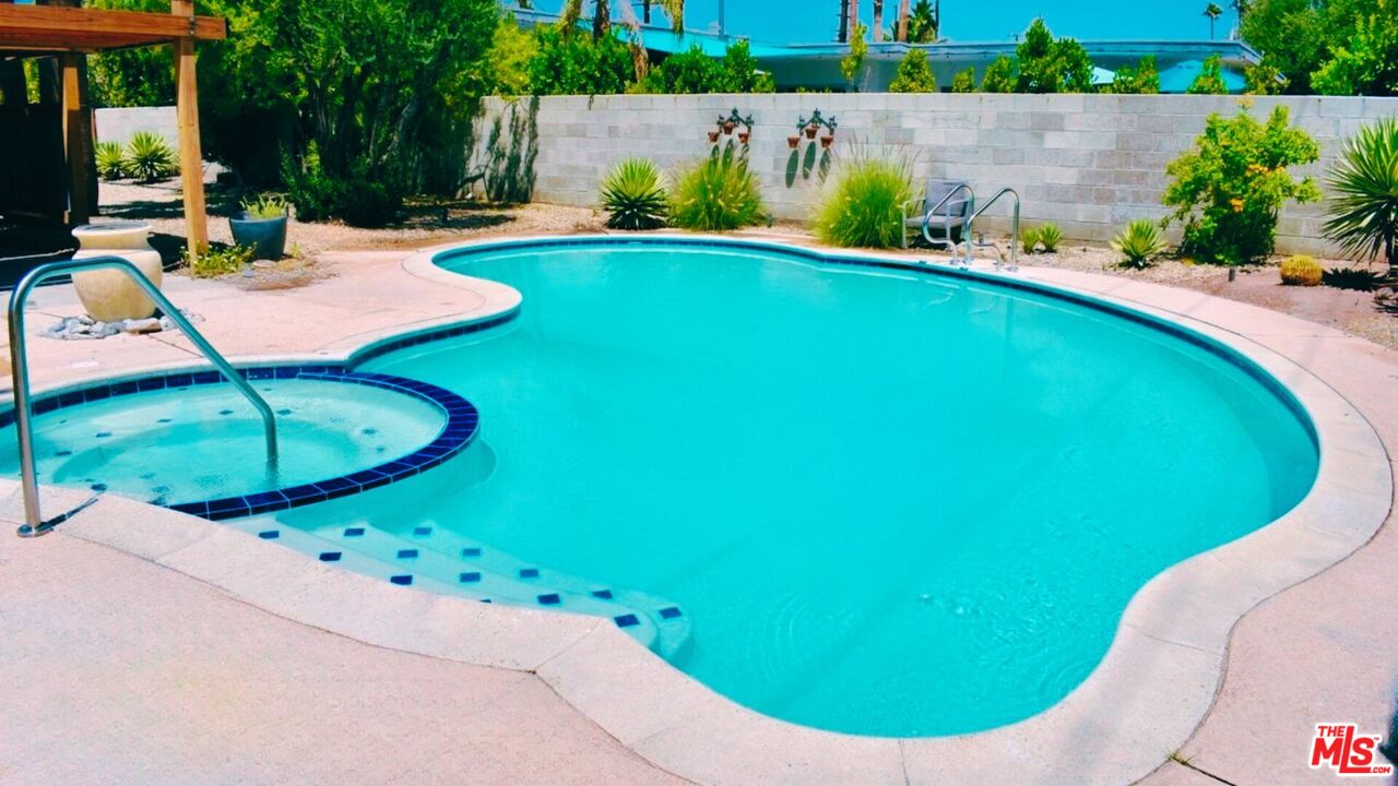 494 North Monterey Road Palm Springs, CA 92262 - Photo 30 of 30 a view of swimming pool with a garden