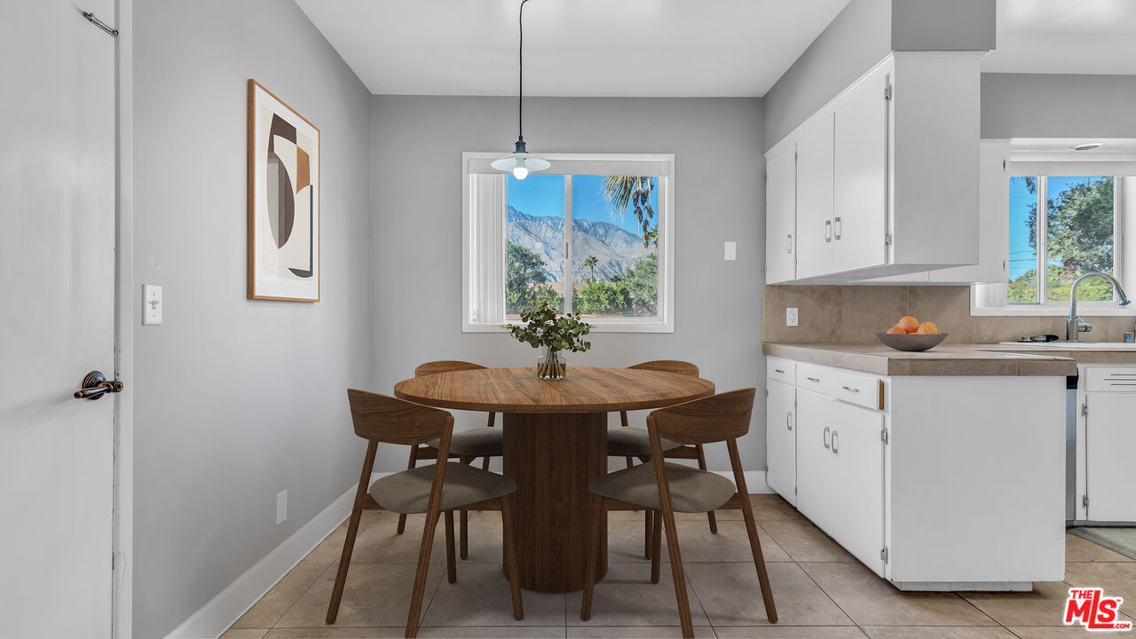 494 North Monterey Road Palm Springs, CA 92262 - Photo 6 of 30 a view of a dining room with furniture and window