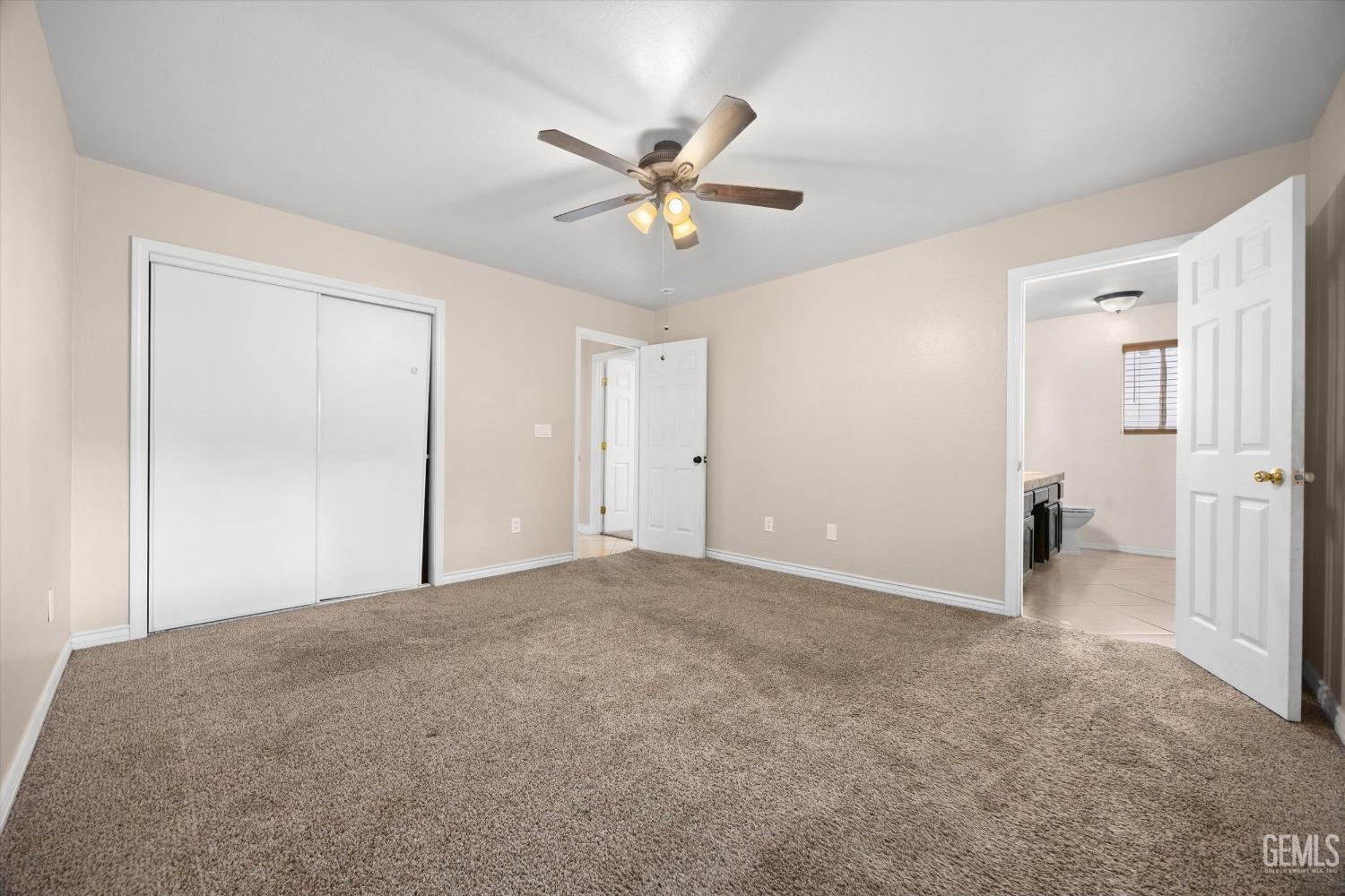 Undisclosed Address Bakersfield, CA 93312 - Photo 22 of 38 a view of a livingroom with a ceiling fan
