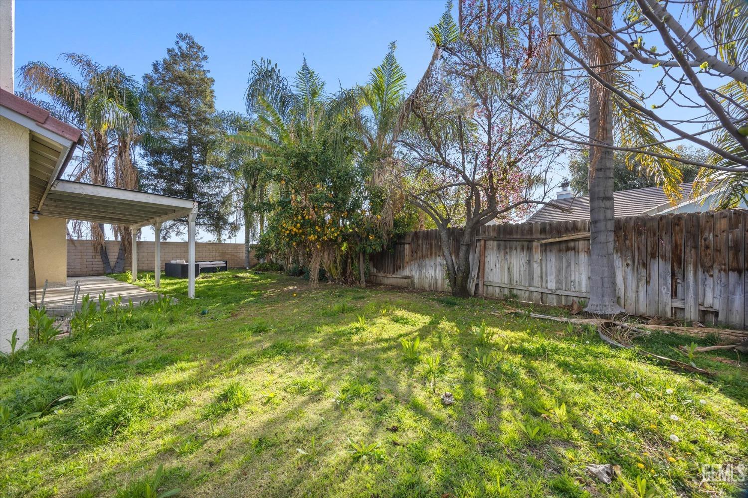 Undisclosed Address Bakersfield, CA 93312 - Photo 38 of 38 a view of a house with a yard