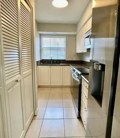 $310,000 | 413 North Cypress Drive, Unit 4, Tequesta, FL 33469