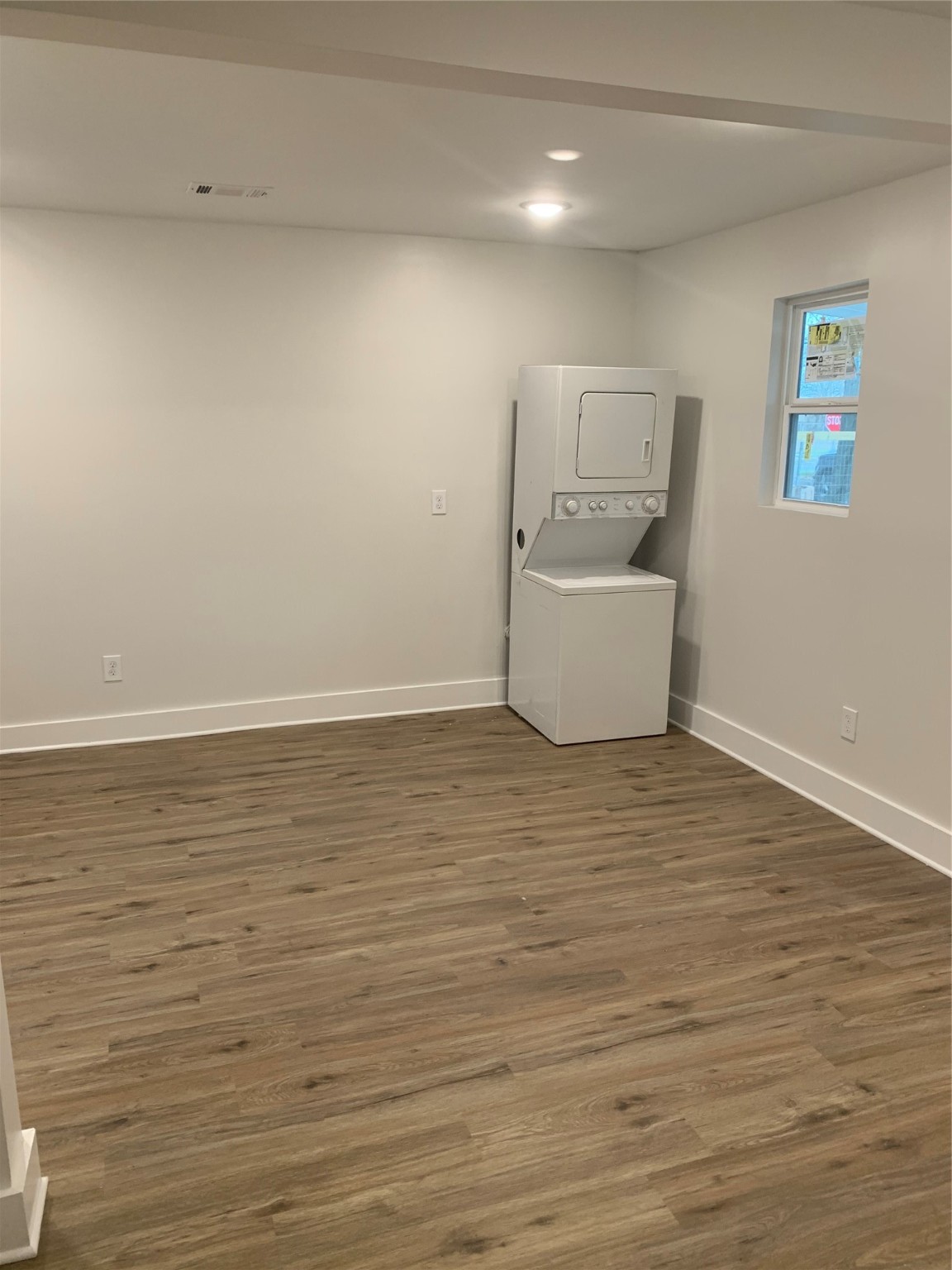 548 Majestic Street, Unit R Houston, TX 77020 - Photo 3 of 6 wooden floor in an empty room