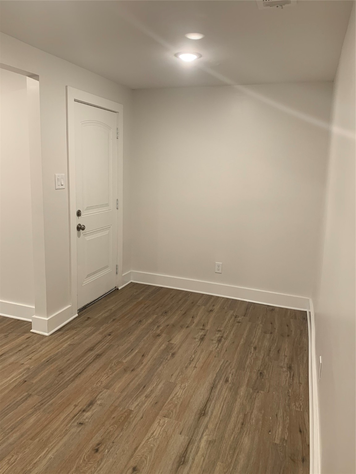 548 Majestic Street, Unit R Houston, TX 77020 - Photo 6 of 6 wooden floor in an empty room