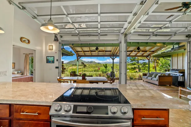 a kitchen with a sink and a large window