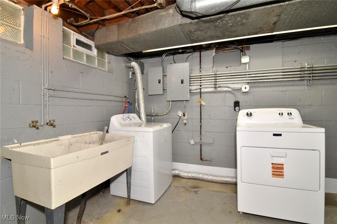 3679 Fenley Road Cleveland Heights, OH 44121 - Photo 36 of 45 Laundry area with electric panel and washer and clothes dryer