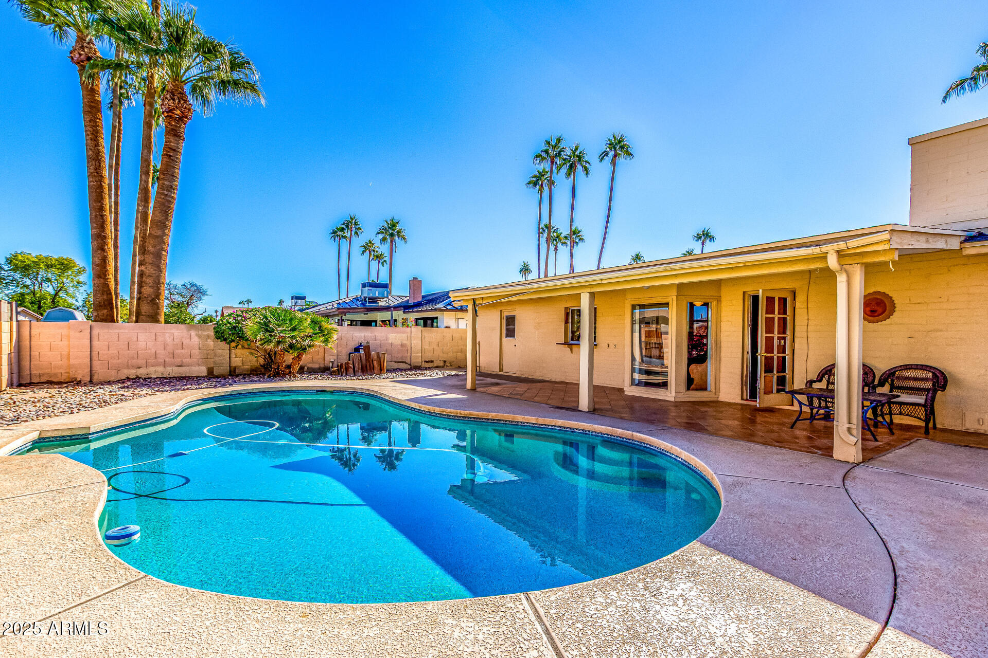 1220 East Julie Drive Tempe, AZ 85283 - Photo 2 of 32 swimming pool view with a seating space