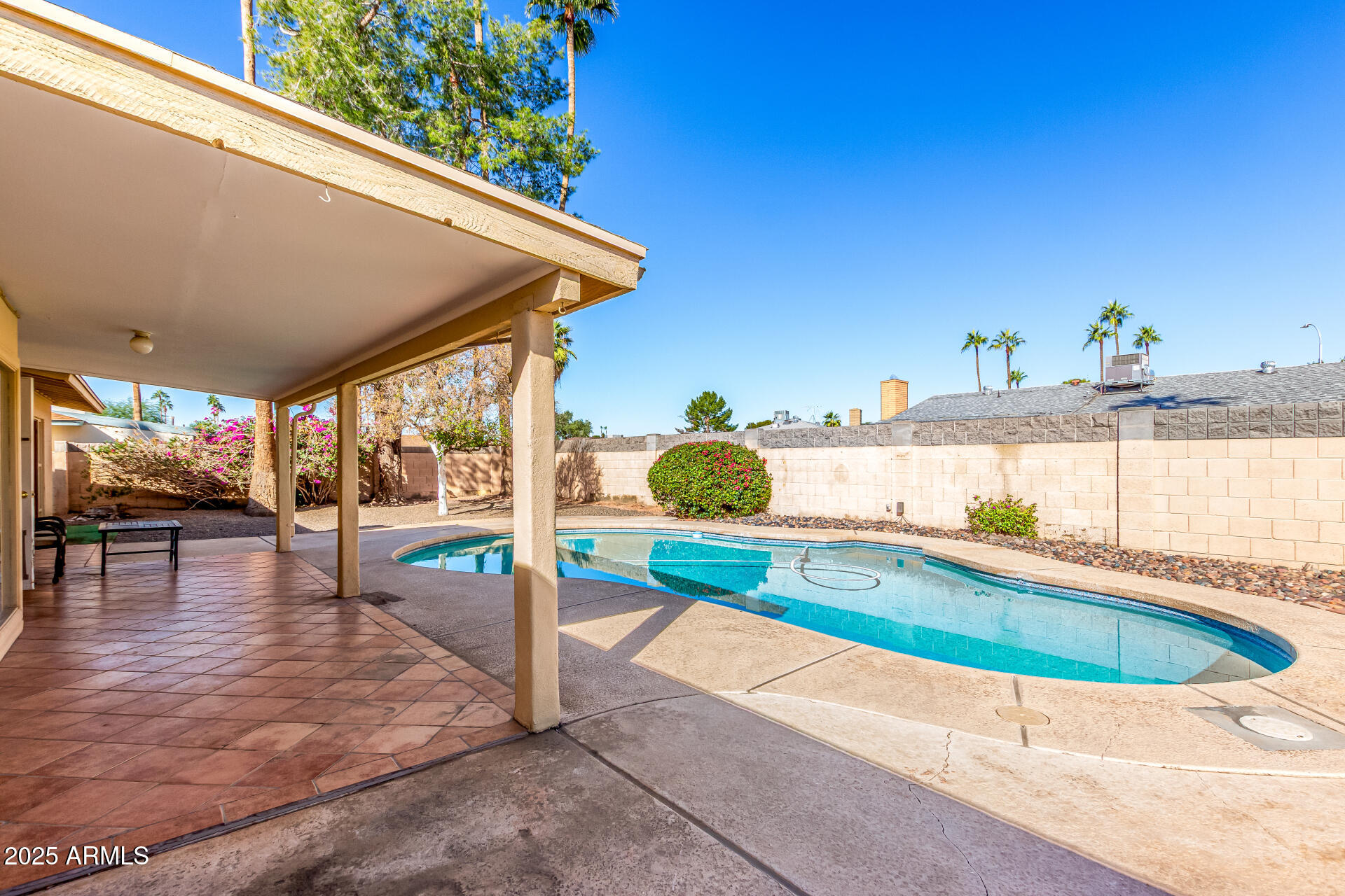 1220 East Julie Drive Tempe, AZ 85283 - Photo 24 of 32 a swimming pool with outdoor seating and yard