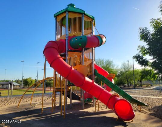 1220 East Julie Drive Tempe, AZ 85283 - Photo 32 of 32 a view of roof deck with dining table and chairs with wooden fence