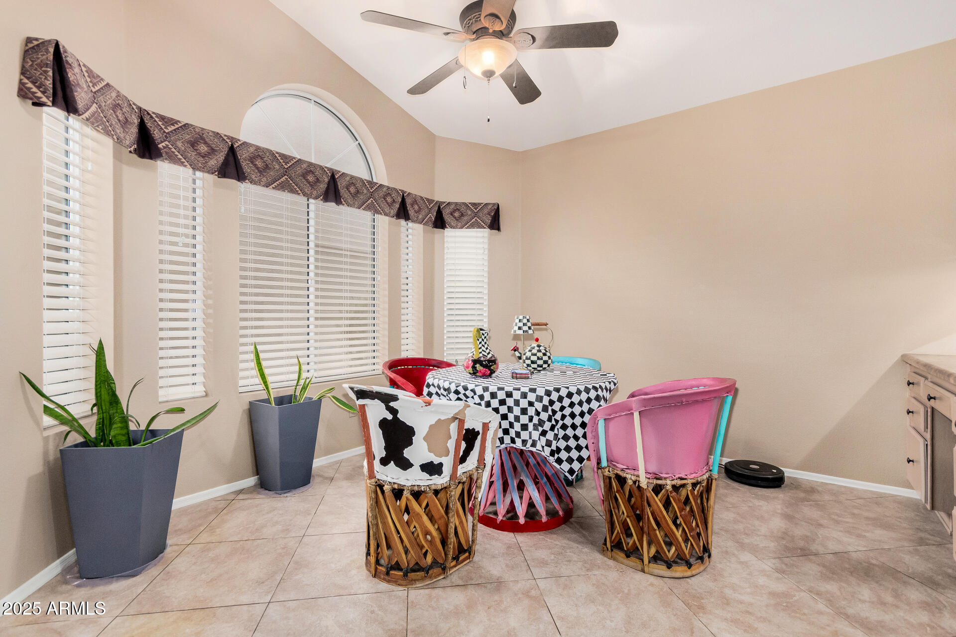 15531 Piccadilly Road Goodyear, AZ 85395 - Photo 18 of 54 a view of a dining room with furniture