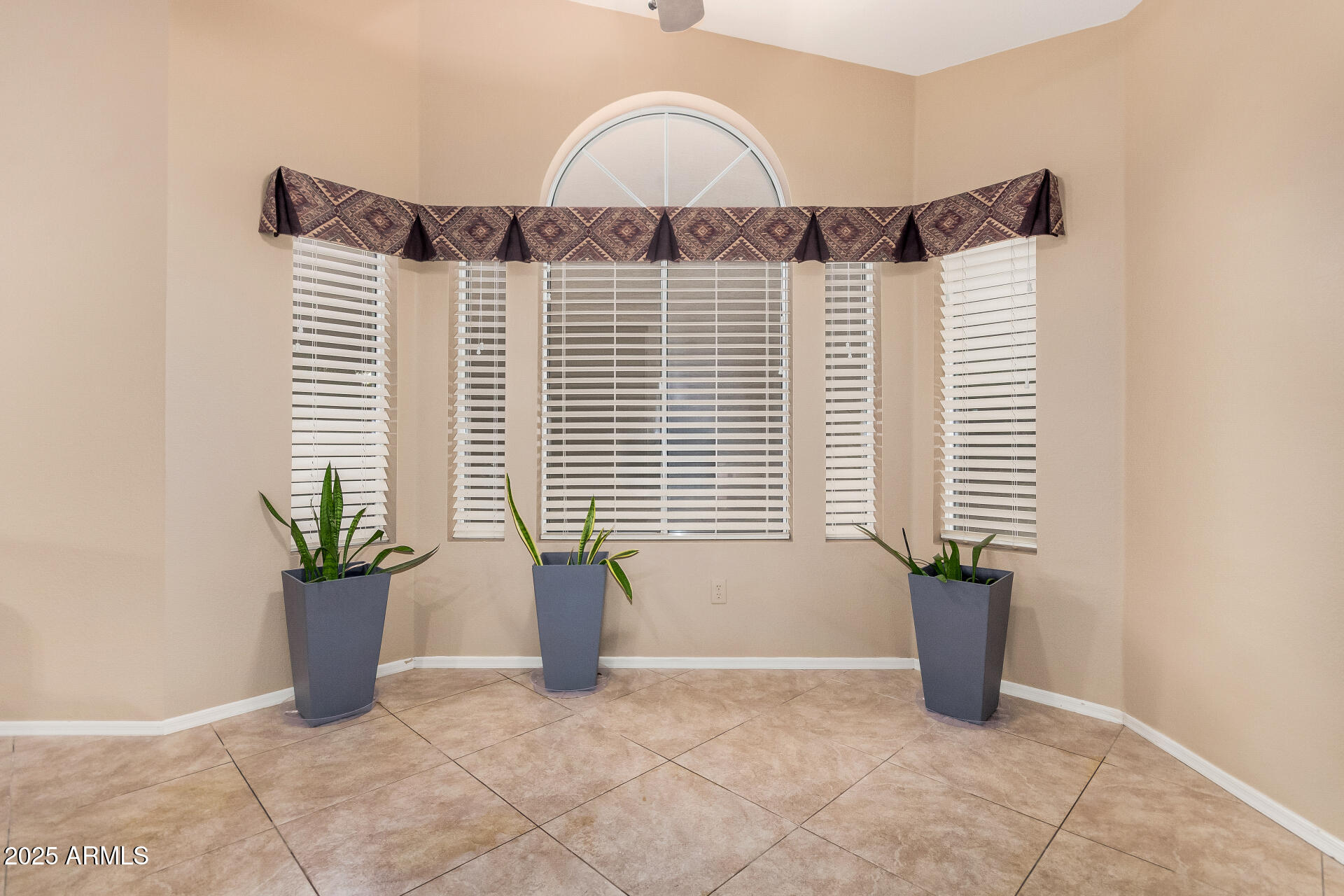 15531 Piccadilly Road Goodyear, AZ 85395 - Photo 19 of 54 a view of a room with a window