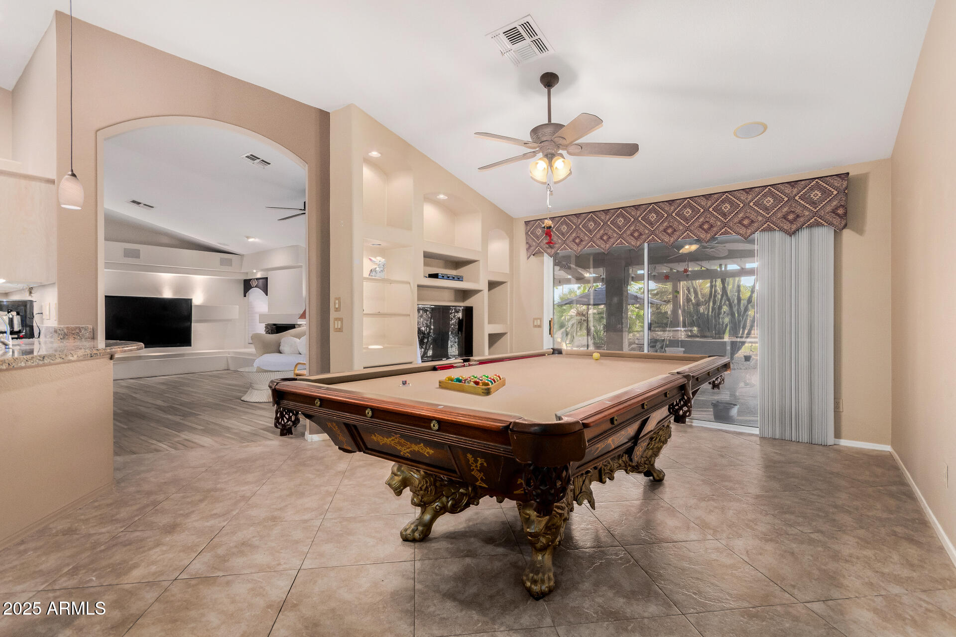 15531 Piccadilly Road Goodyear, AZ 85395 - Photo 21 of 54 a room with pool table and windows