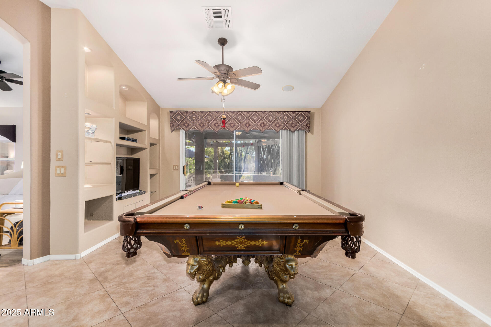 15531 Piccadilly Road Goodyear, AZ 85395 - Photo 23 of 54 a room with pool table and windows
