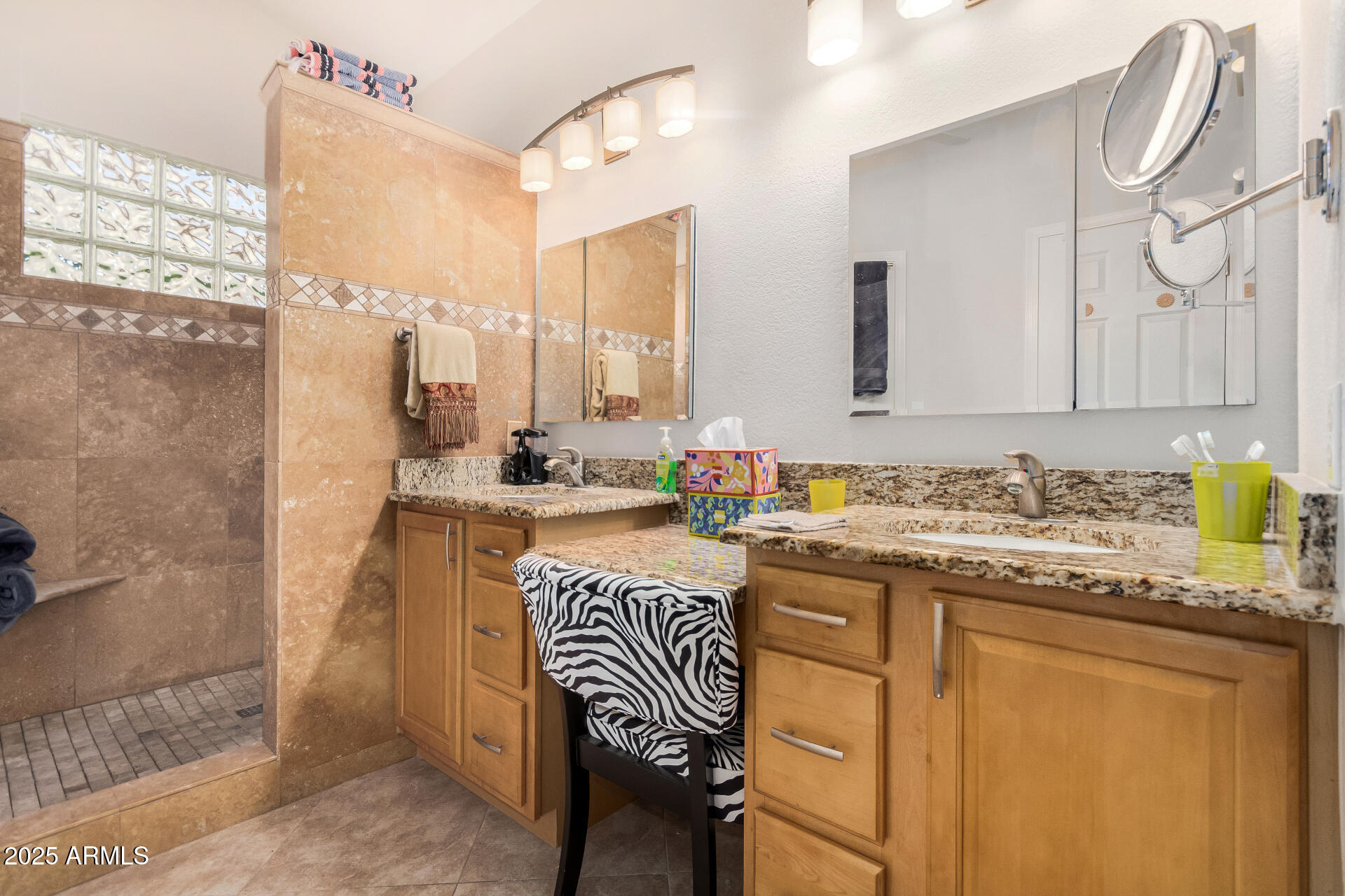 15531 Piccadilly Road Goodyear, AZ 85395 - Photo 33 of 54 a bathroom with a granite countertop sink and a mirror
