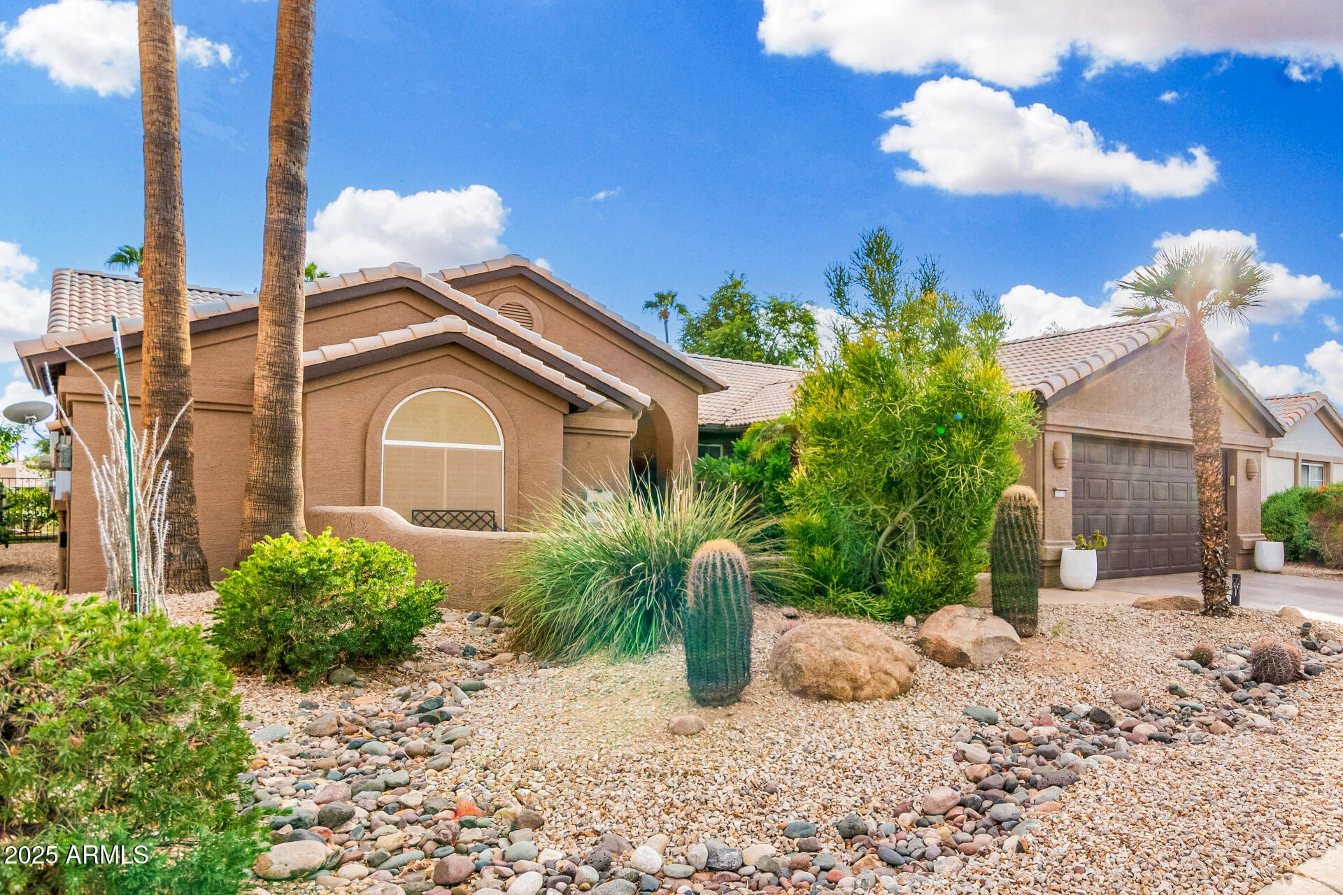 15531 Piccadilly Road Goodyear, AZ 85395 - Photo 10 of 54 a house view with a outdoor space