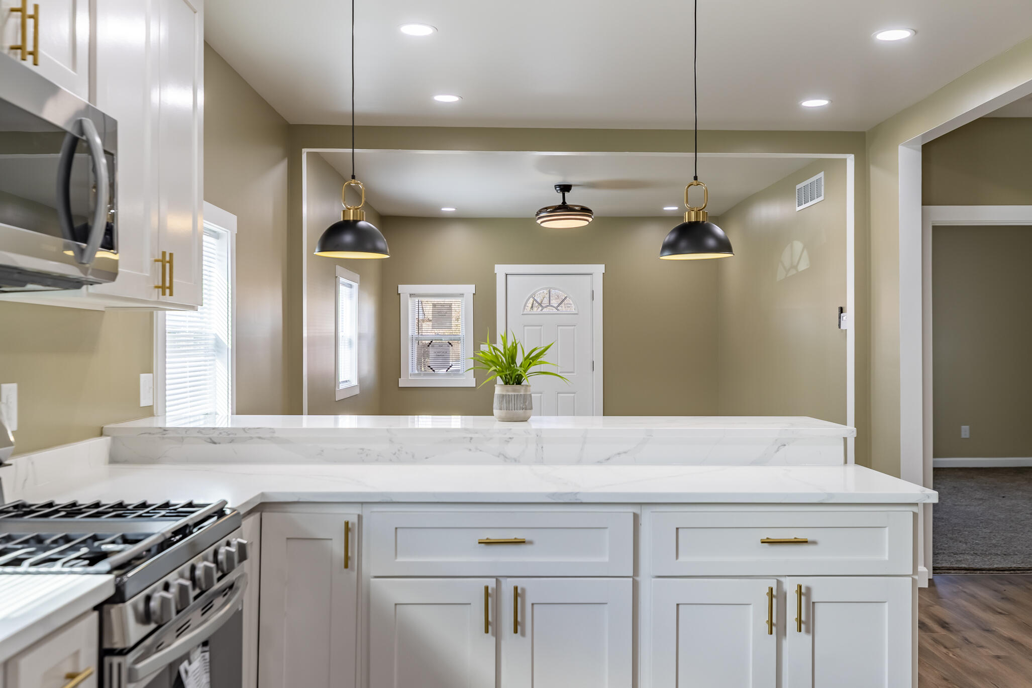 1047 Arizona Street Gary, IN 46403 - Photo 14 of 35 a kitchen with a sink and refrigerator
