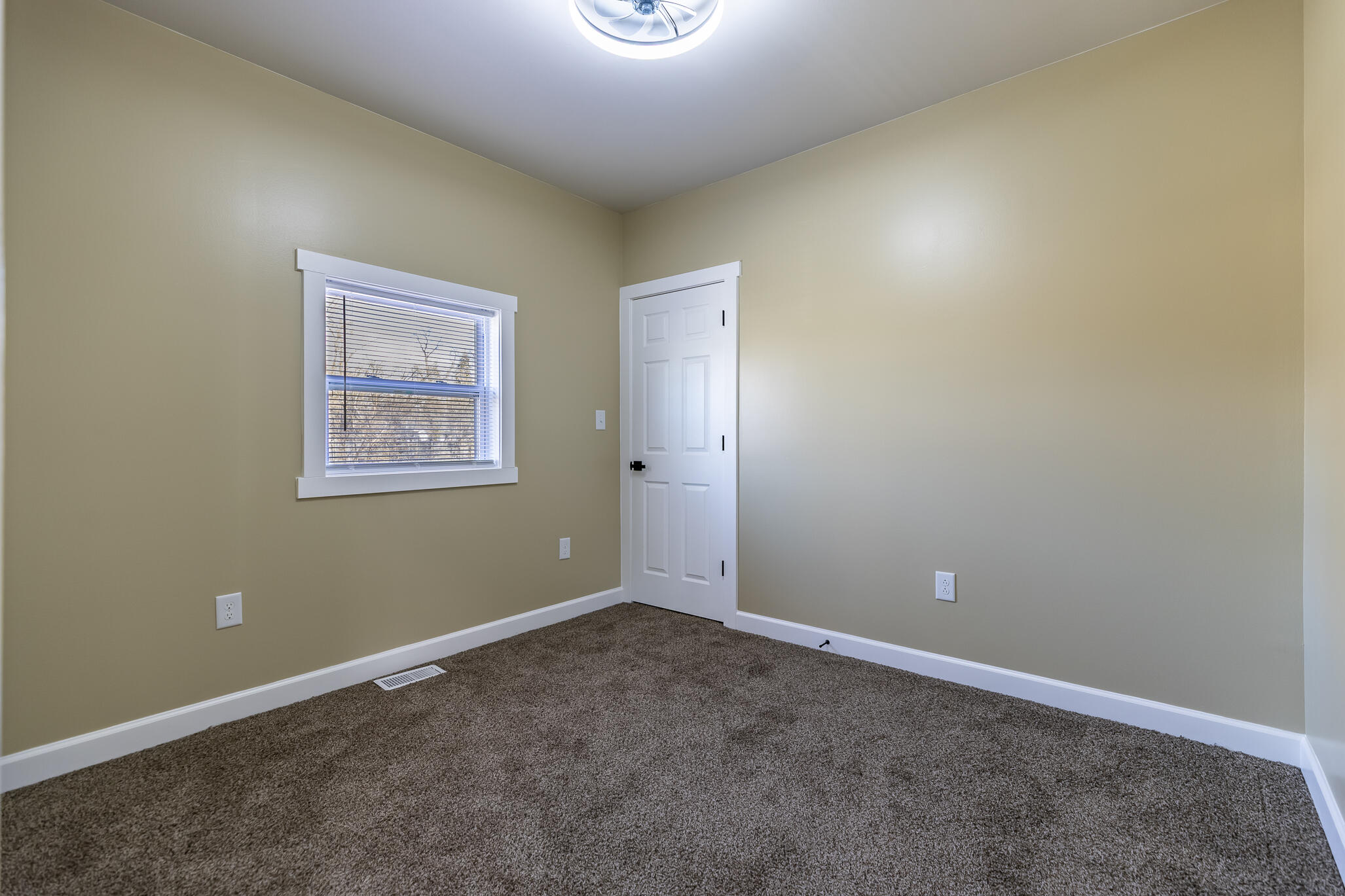 1047 Arizona Street Gary, IN 46403 - Photo 19 of 35 an empty room with a window