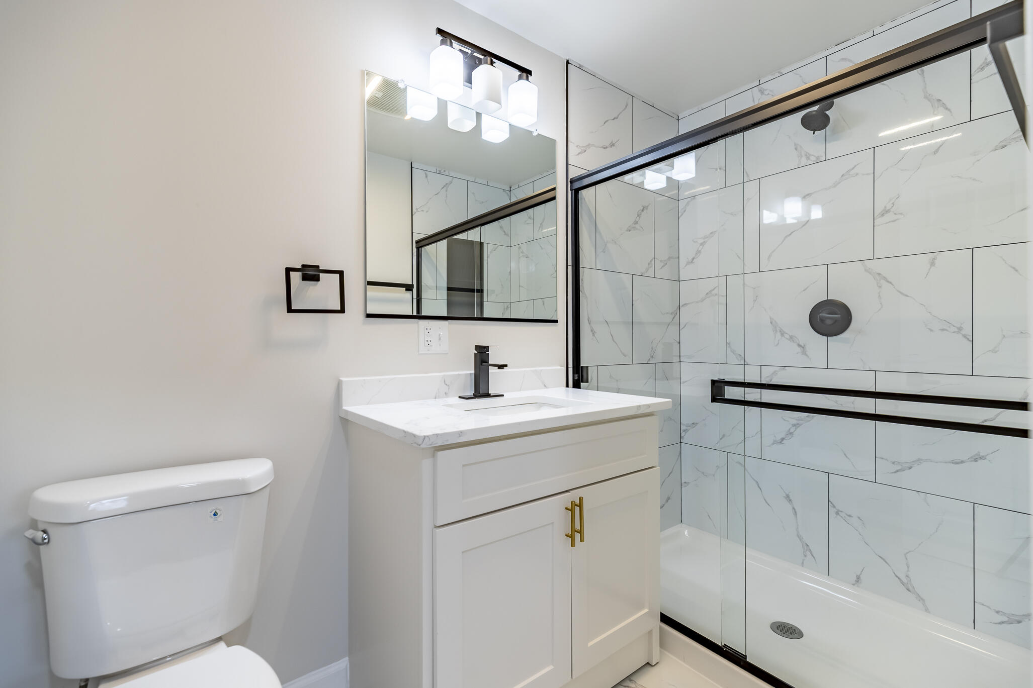 1047 Arizona Street Gary, IN 46403 - Photo 22 of 35 a bathroom with a sink toilet and shower