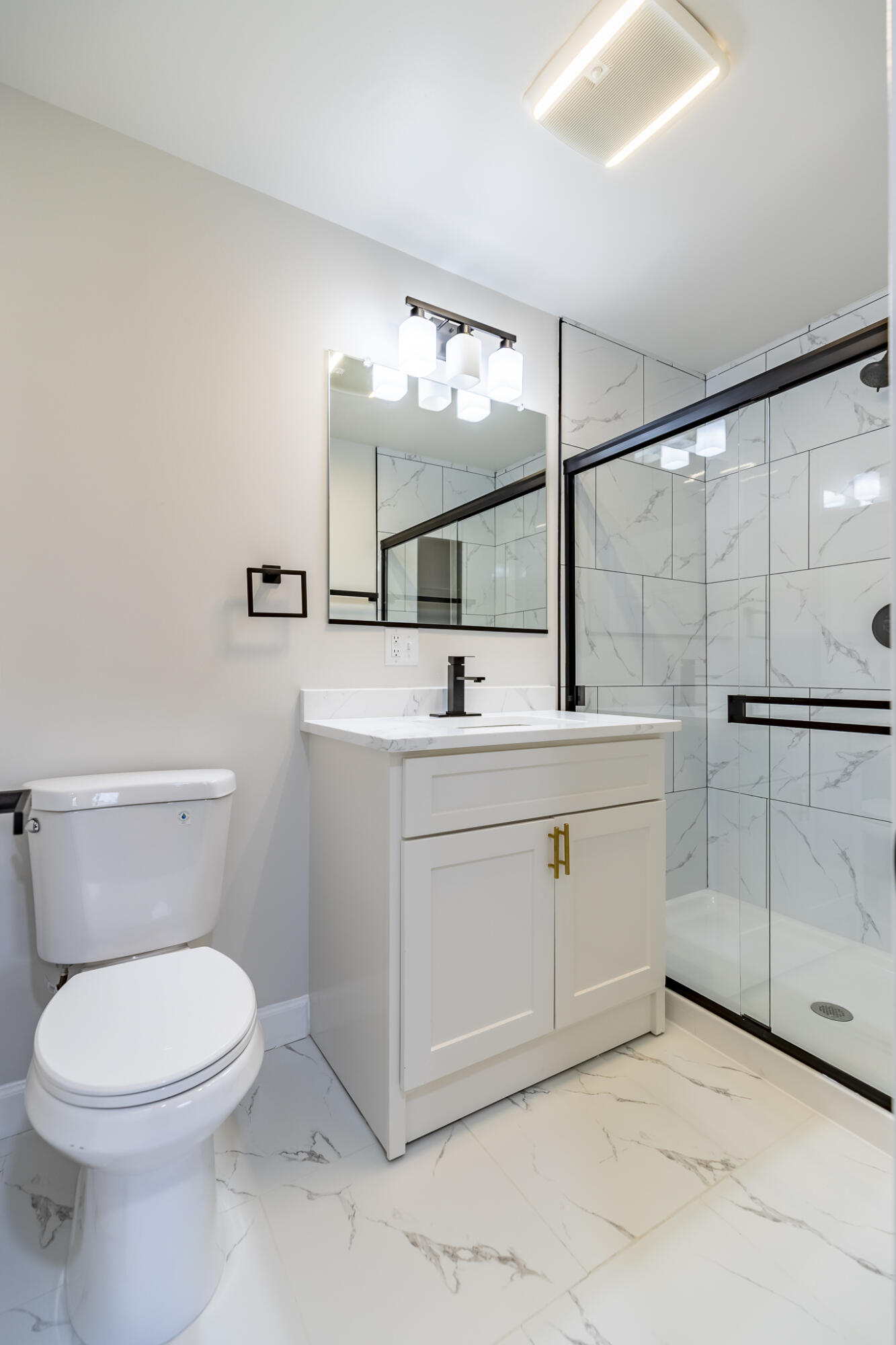 1047 Arizona Street Gary, IN 46403 - Photo 23 of 35 a bathroom with a toilet sink and mirror