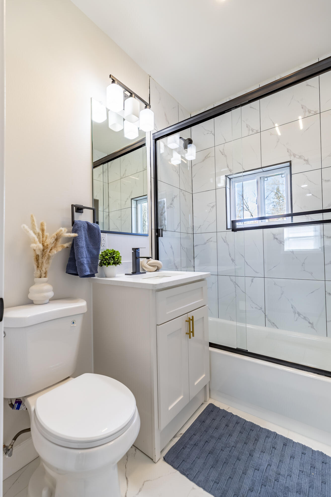 1047 Arizona Street Gary, IN 46403 - Photo 25 of 35 a bathroom with a toilet sink and mirror