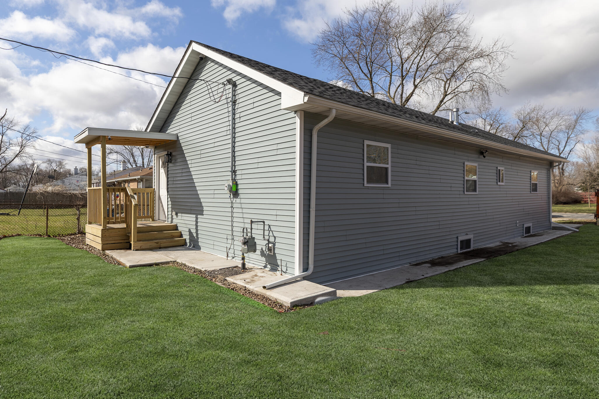 1047 Arizona Street Gary, IN 46403 - Photo 28 of 35 a backyard of a house with table and chairs