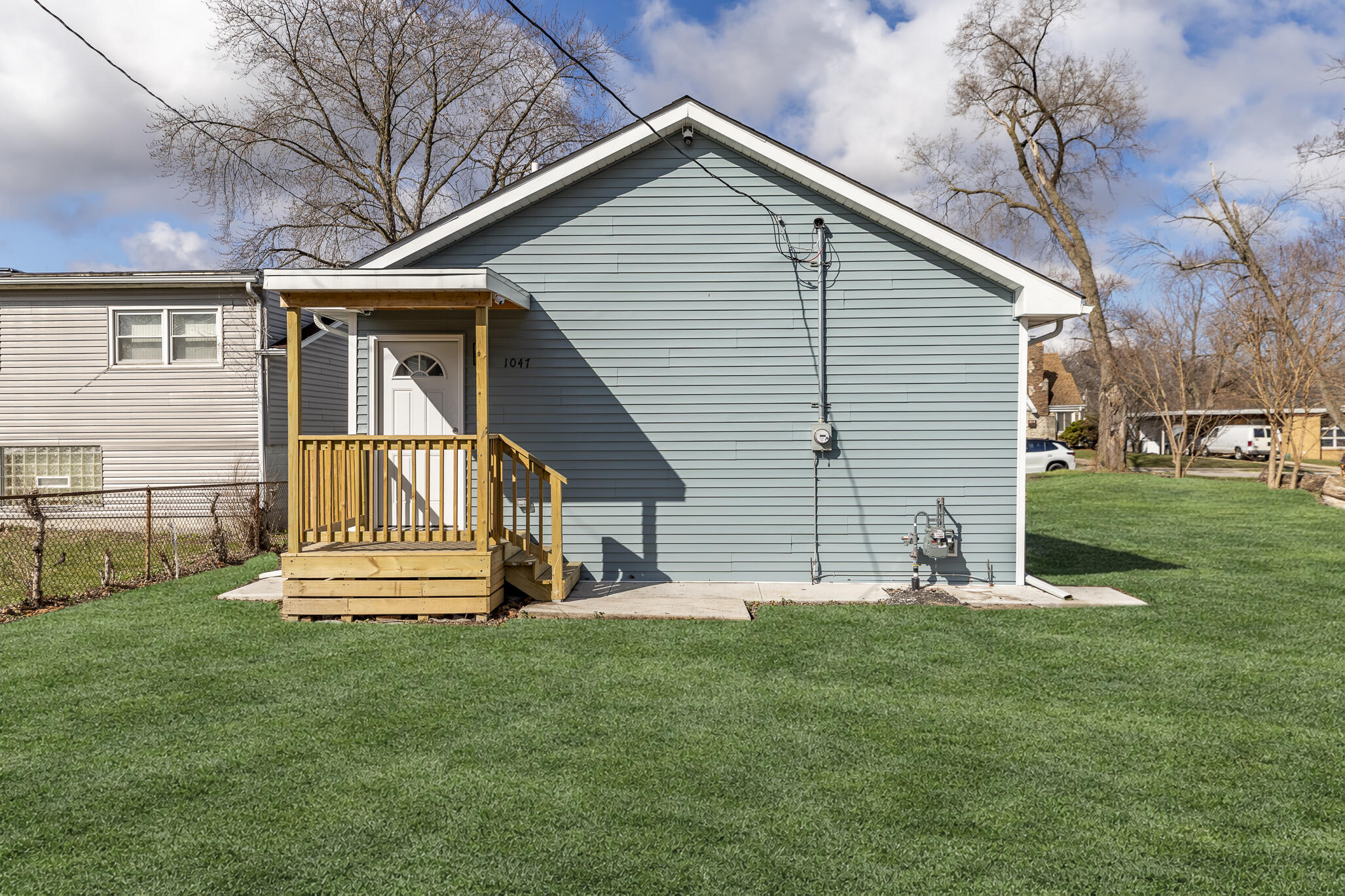 1047 Arizona Street Gary, IN 46403 - Photo 30 of 35 a front view of a house with a yard