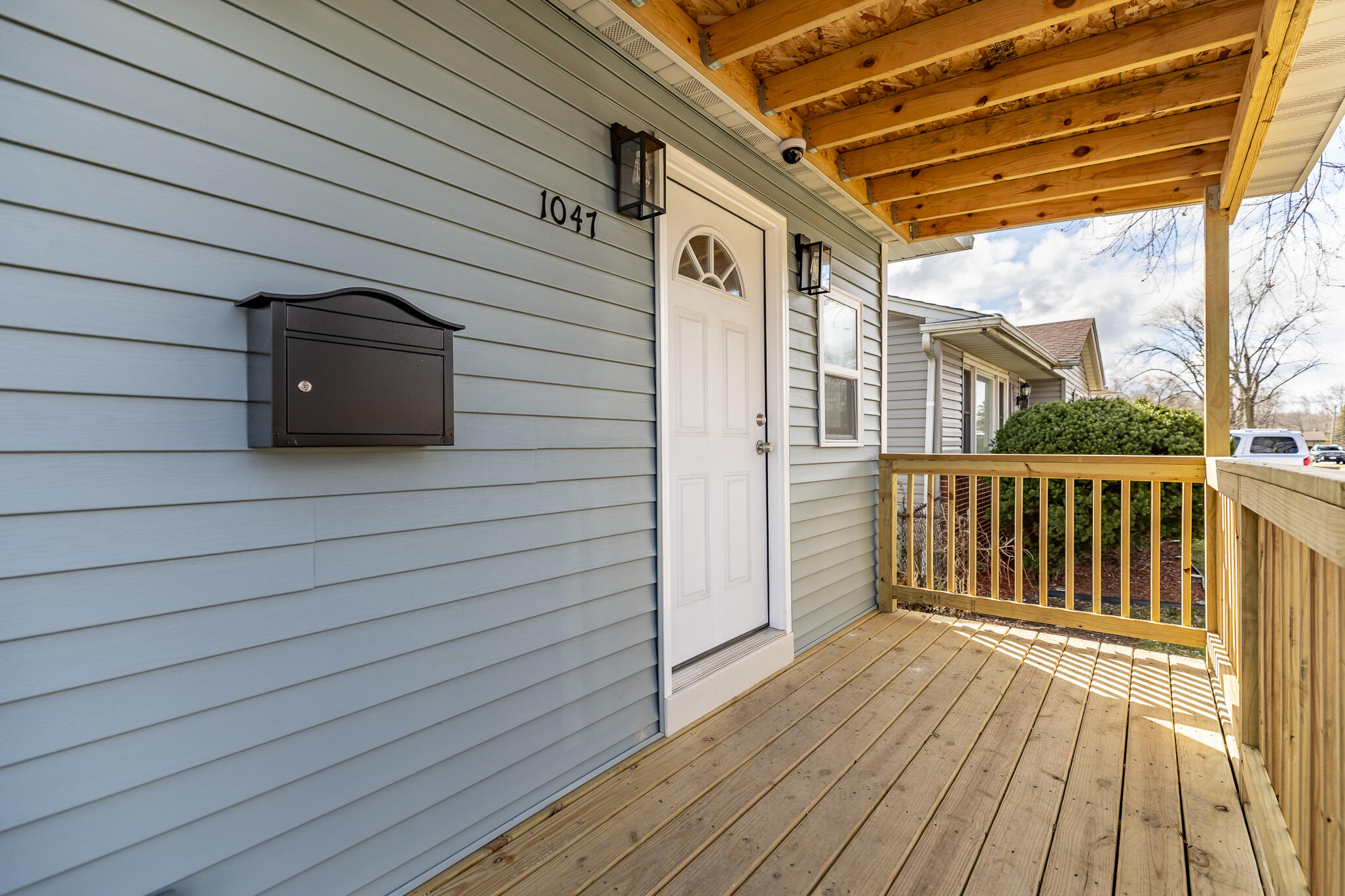 1047 Arizona Street Gary, IN 46403 - Photo 3 of 35 a view of a door and wooden floor in front of a house