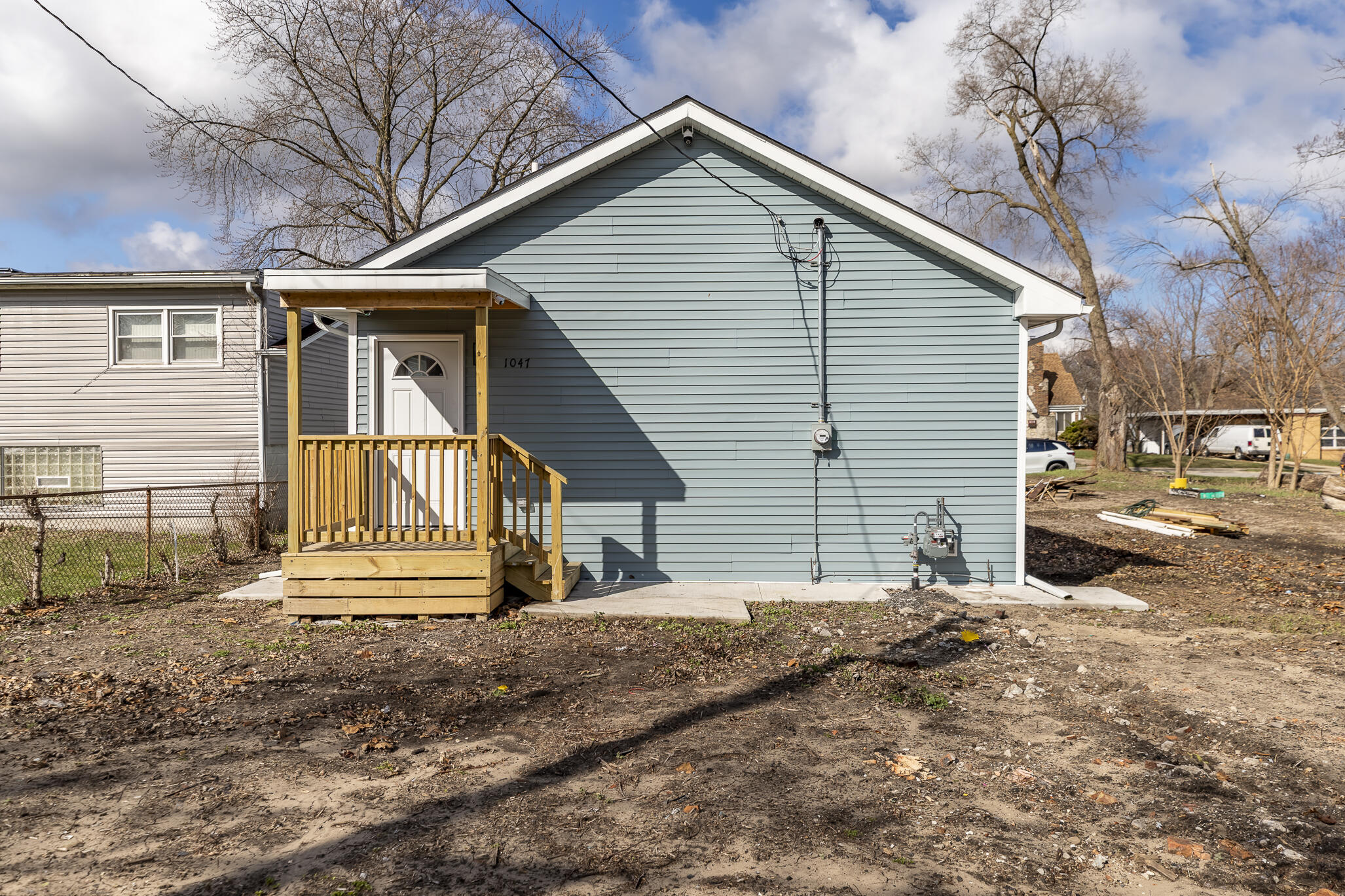 1047 Arizona Street Gary, IN 46403 - Photo 31 of 35 a front view of a house with a yard