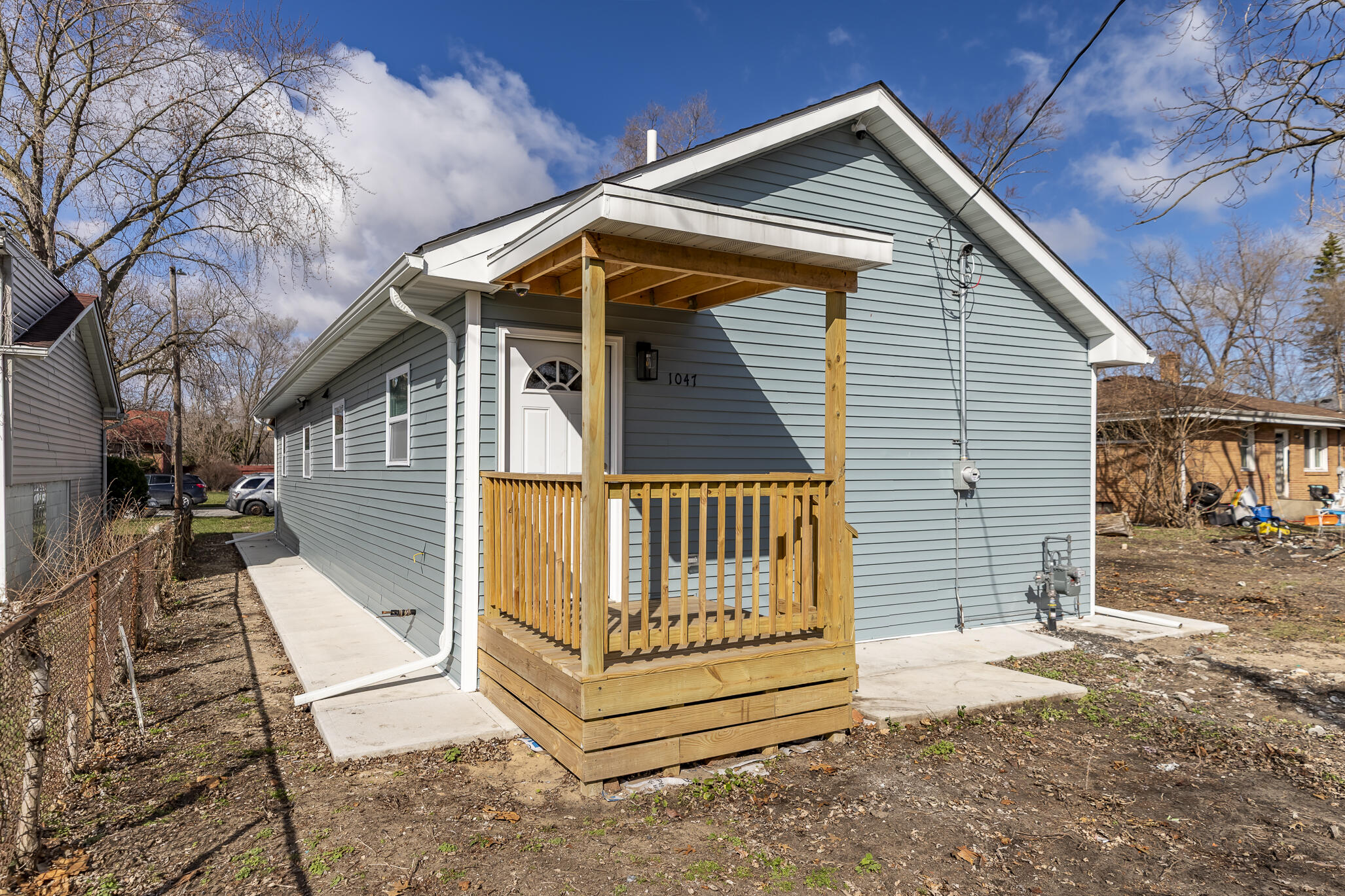 1047 Arizona Street Gary, IN 46403 - Photo 33 of 35 a view of wooden house with a small yard