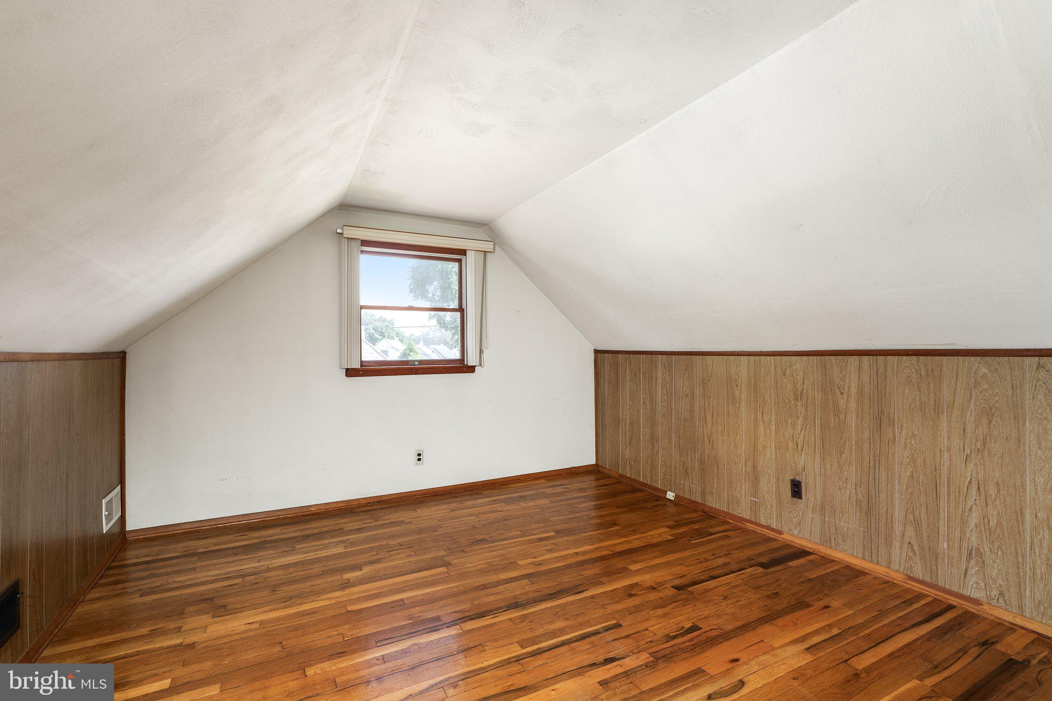 44 Falmouth Road Hamilton, NJ 08620 - Photo 17 of 27 an empty room with wooden floor and windows