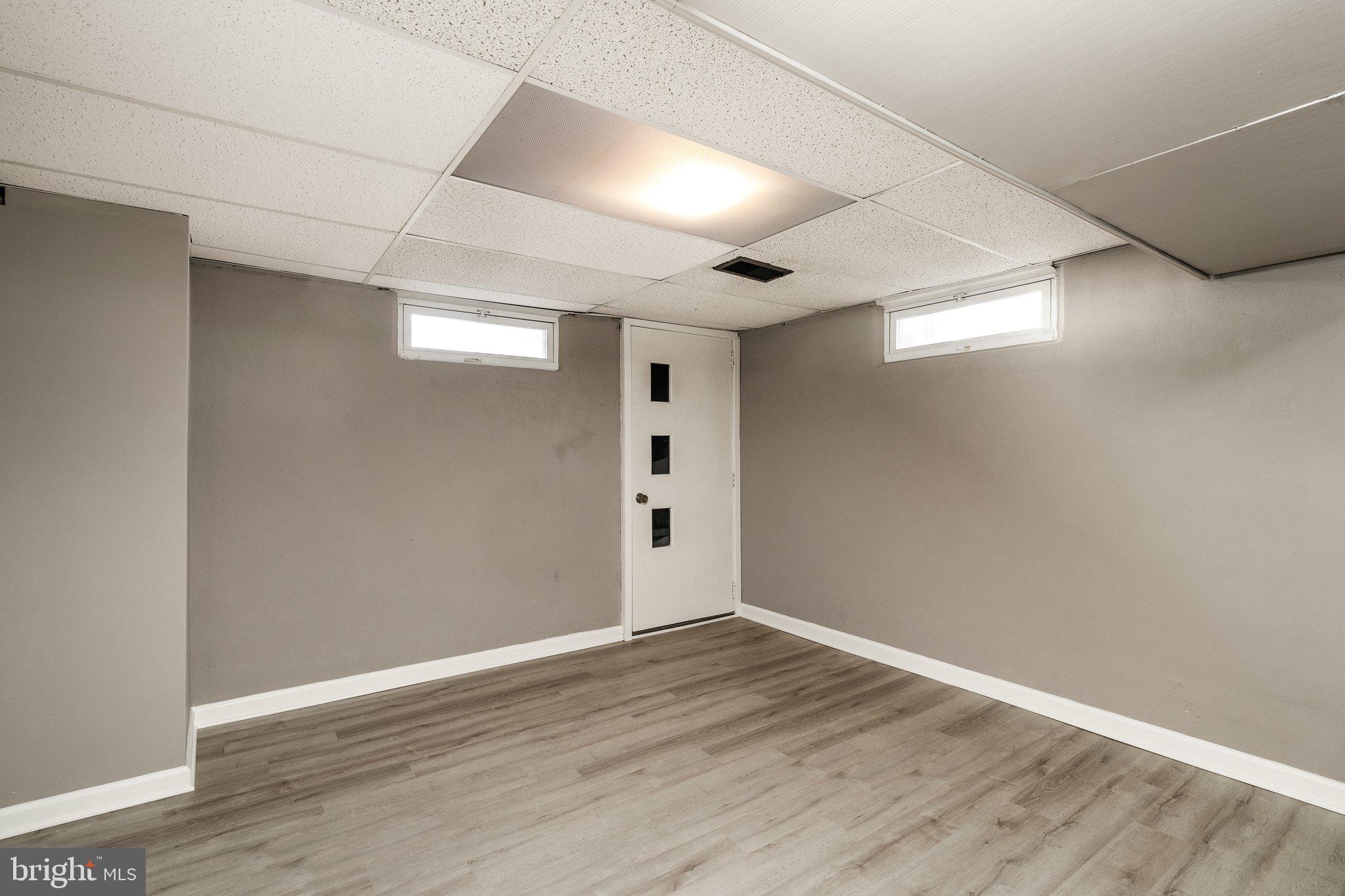 44 Falmouth Road Hamilton, NJ 08620 - Photo 22 of 27 a view of an empty room with wooden floor