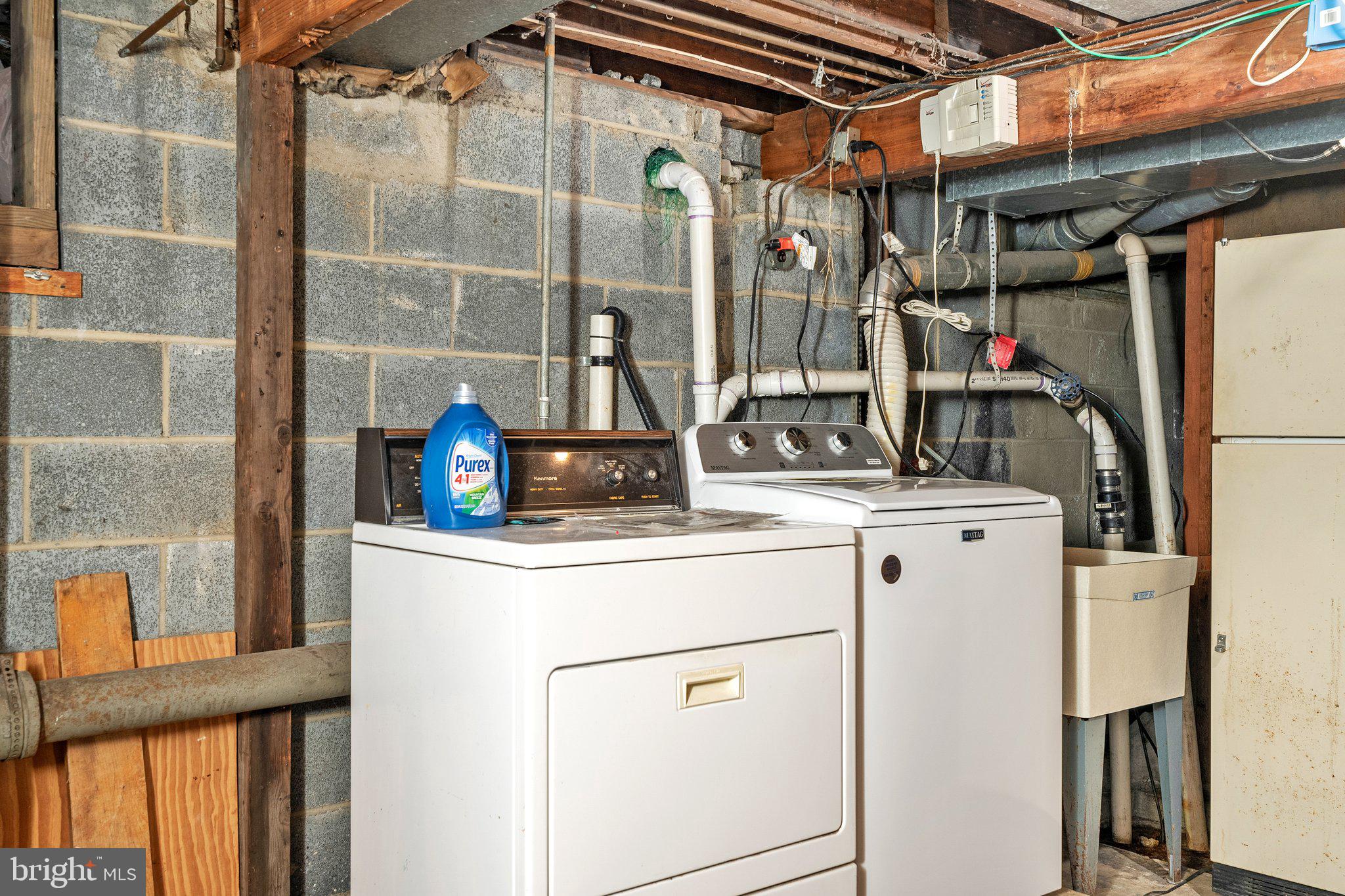 44 Falmouth Road Hamilton, NJ 08620 - Photo 25 of 27 a utility room with dryer and washer