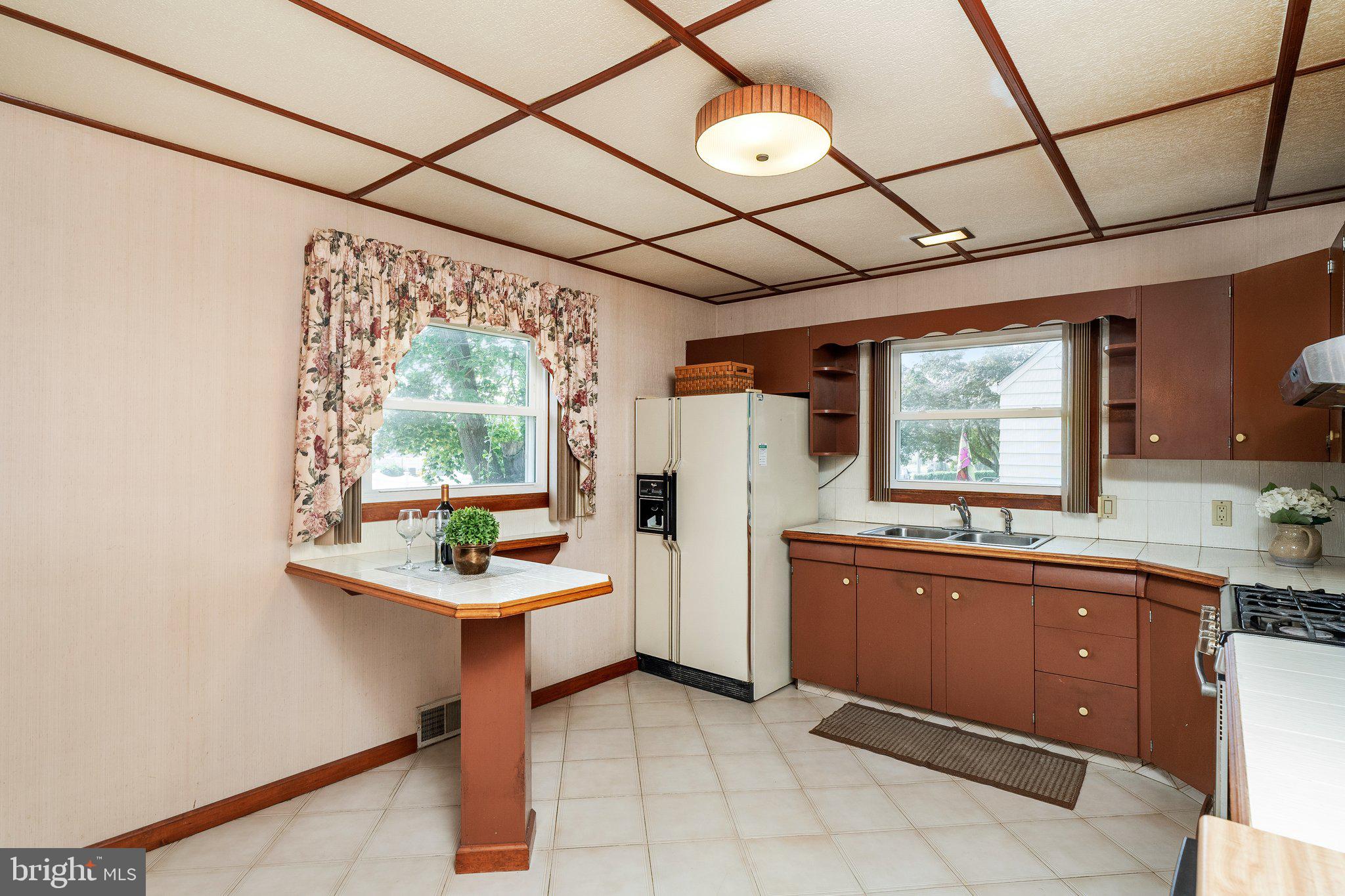 44 Falmouth Road Hamilton, NJ 08620 - Photo 6 of 27 a room with sink cabinets and appliances