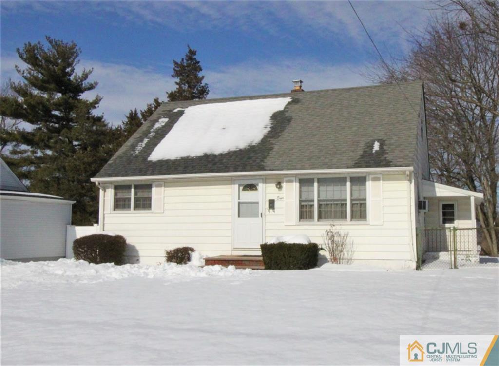 8 Longfield Road New Brunswick, NJ 08901 - Photo 1 of 8 front view of a house with a yard